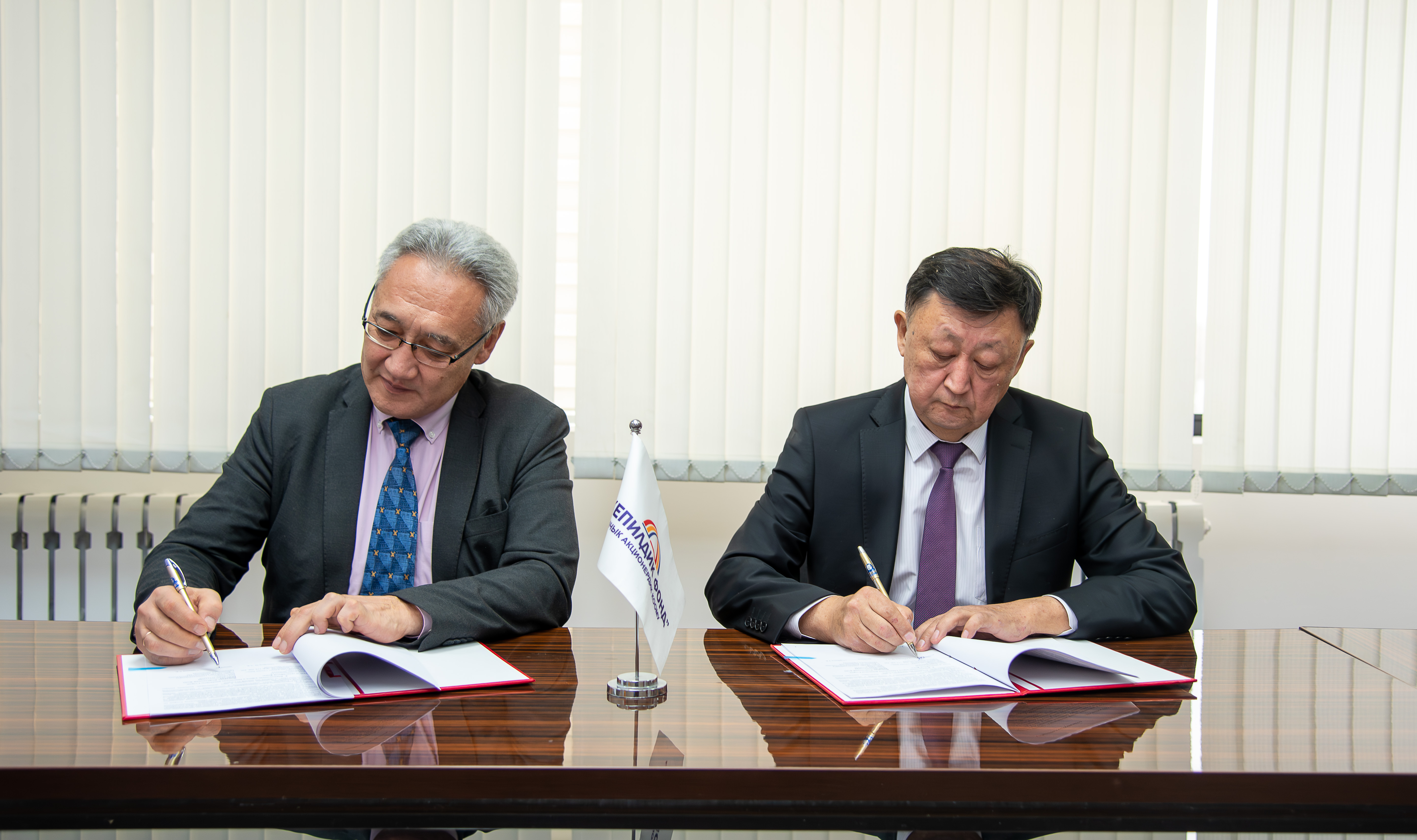 On the signing of a cooperation agreement between the Hungarian-Kyrgyz Development Fund and OJSC Guarantee Fund